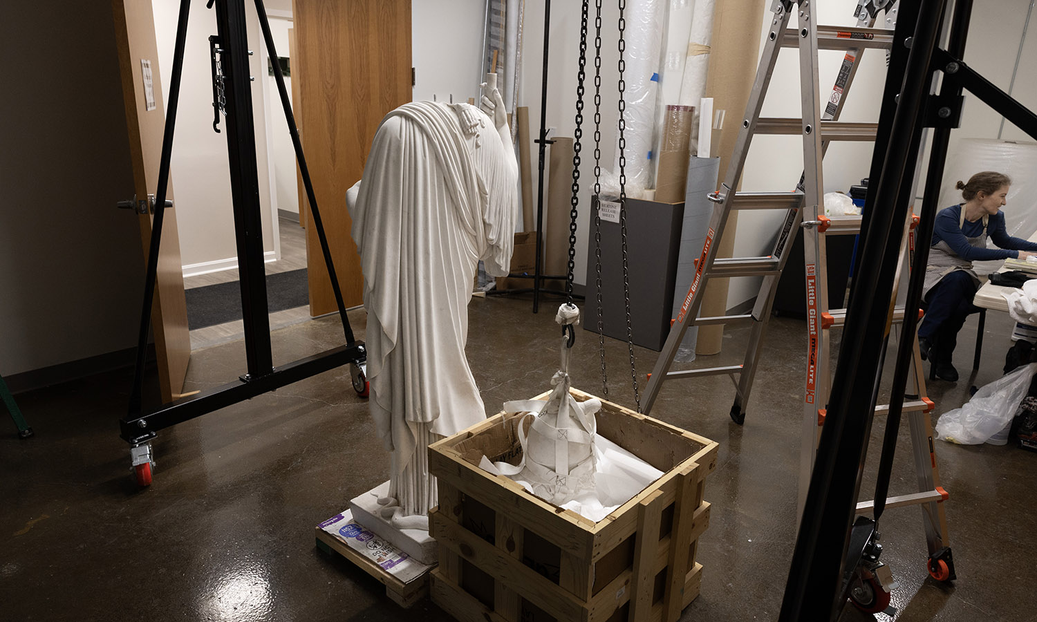 A gantry crane was purchased to reattach Minerva's 60lb. head without causing further damage.