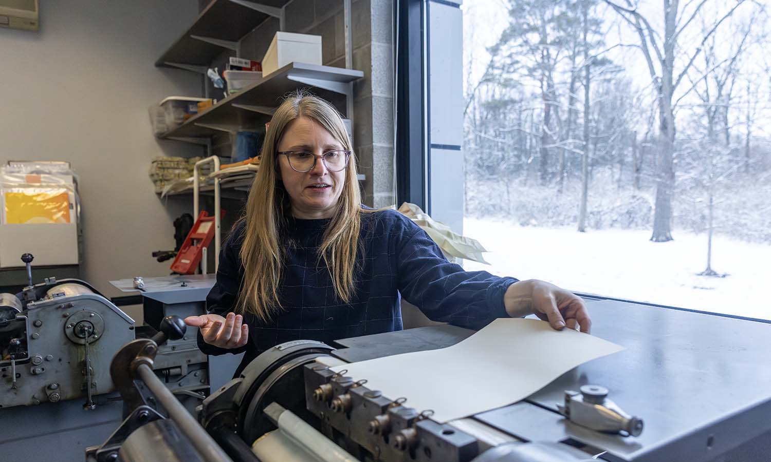 Director Mary Tasillo at work in the Book Arts Center