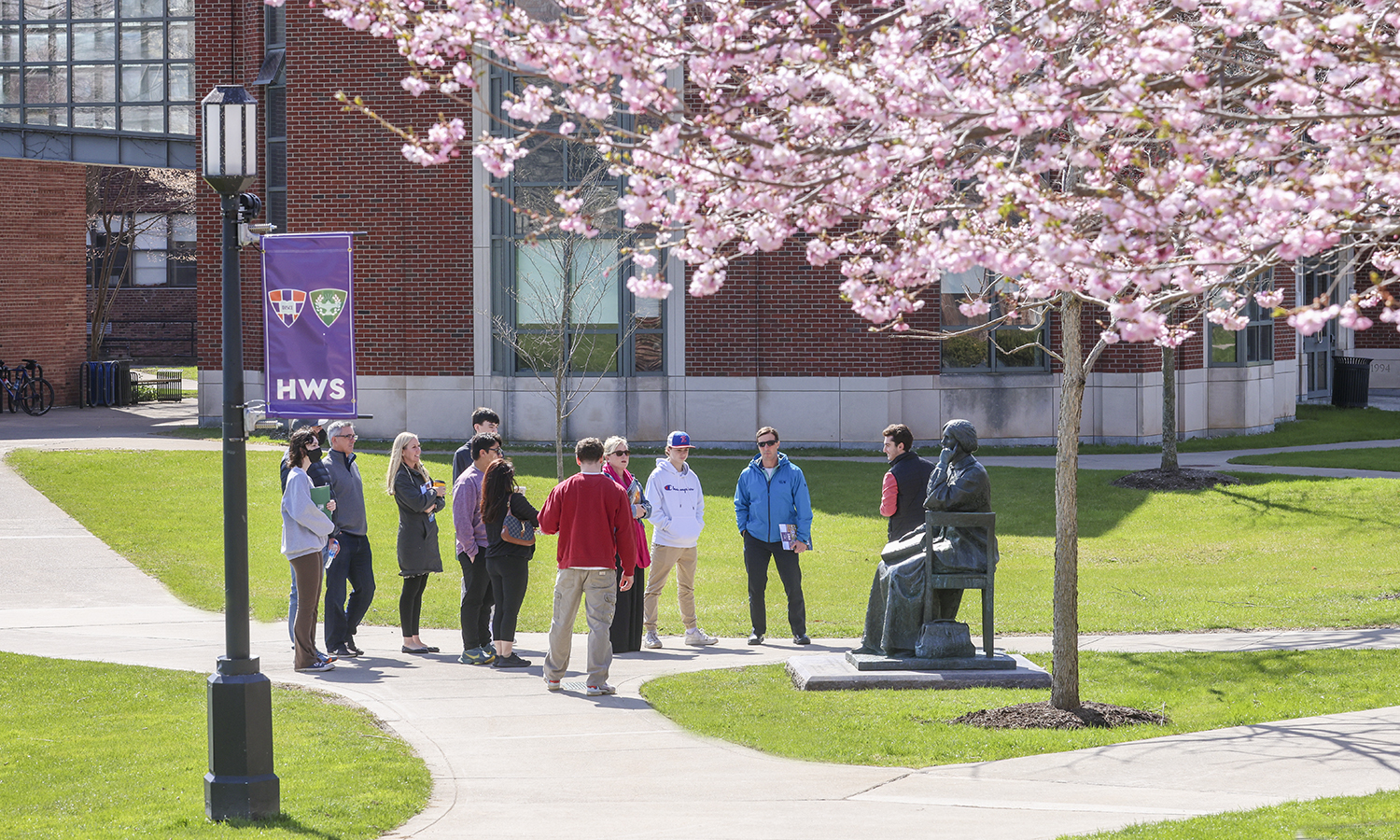 During a campus tour, Ben Farrell ’24 and Dan Anselmi ’24 answer questions from a group of prospective students and their families.