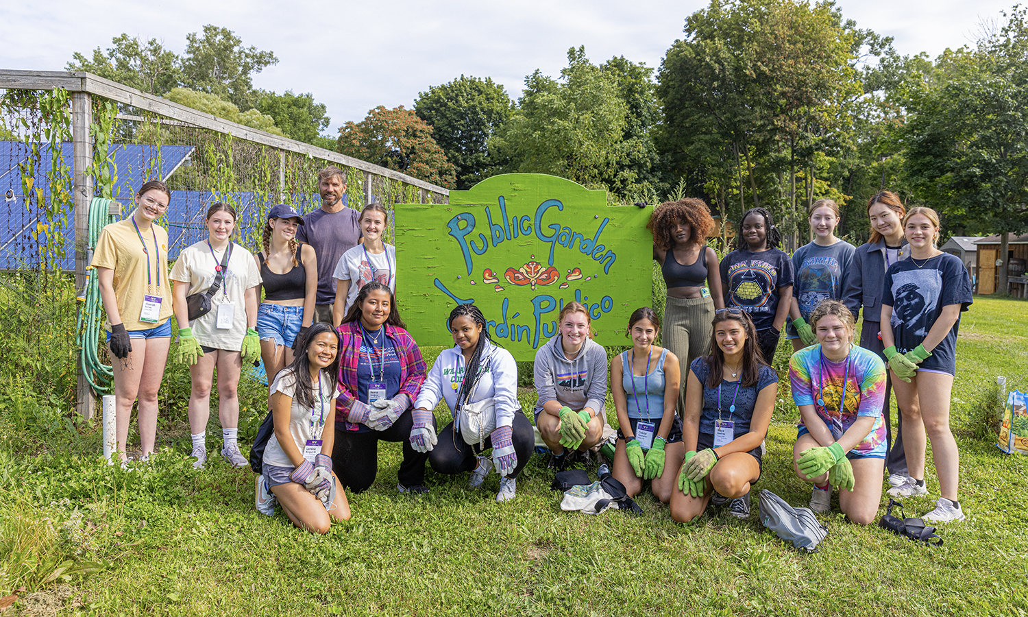As part of Orientation, students participate in community service activities. Here, they gather for a photo after working in the community garden on State Street.