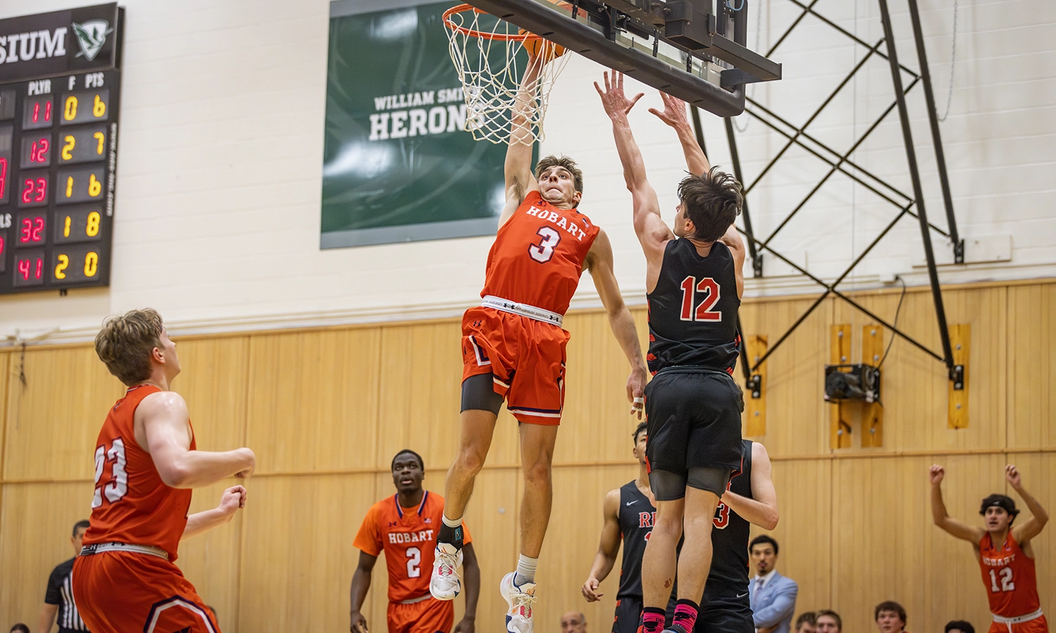Pat Healy ’25 goes for a dunk during Hobart’s win over RPI. The Statesmen beat the Engineers to improve to 7-0.