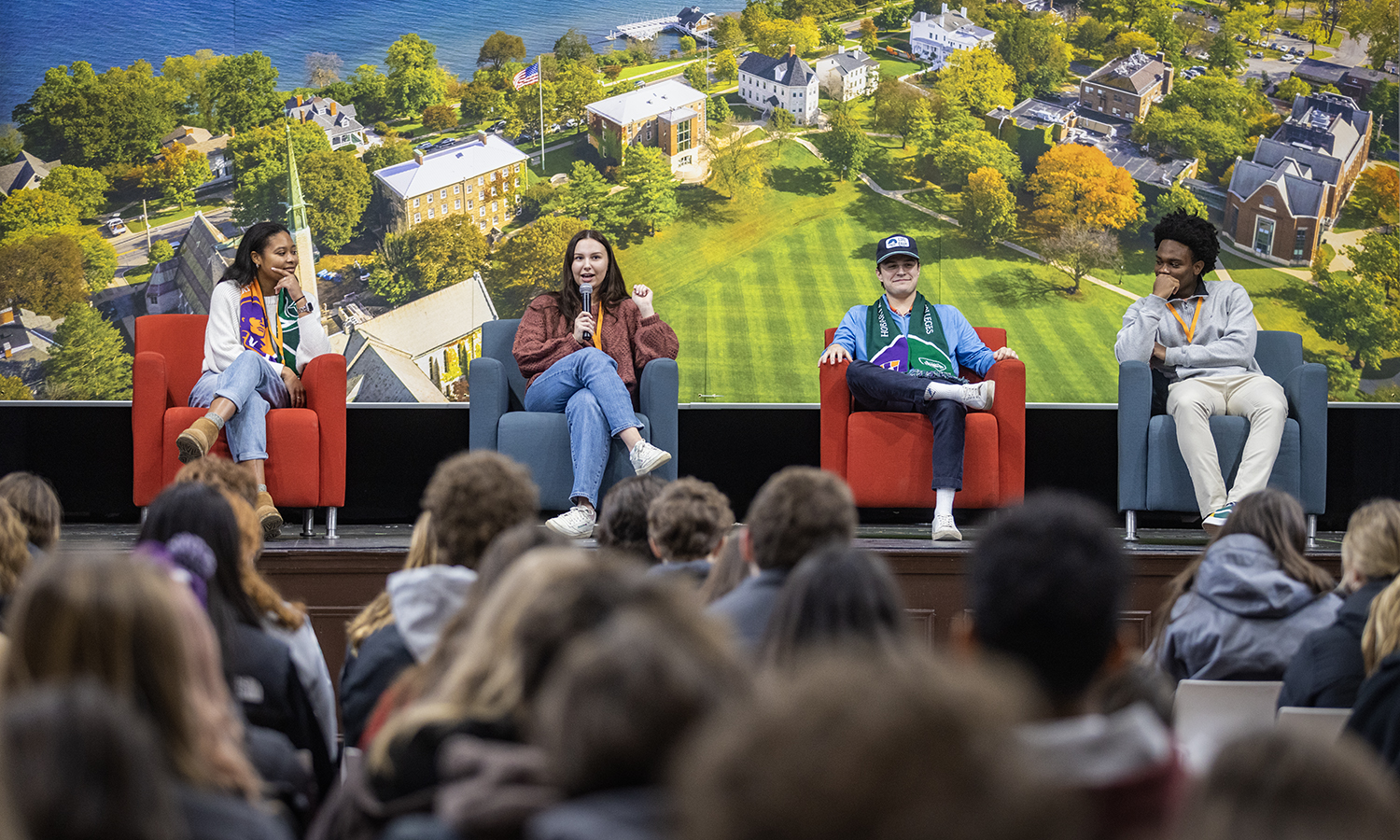 Tia Thevenin ’23, Katie Brown ’23, Will Ailing-Ganey ’23 and Abdoulaye Diallo ’23 talk with prospective students during the Admitted Student Open House on Saturday.
