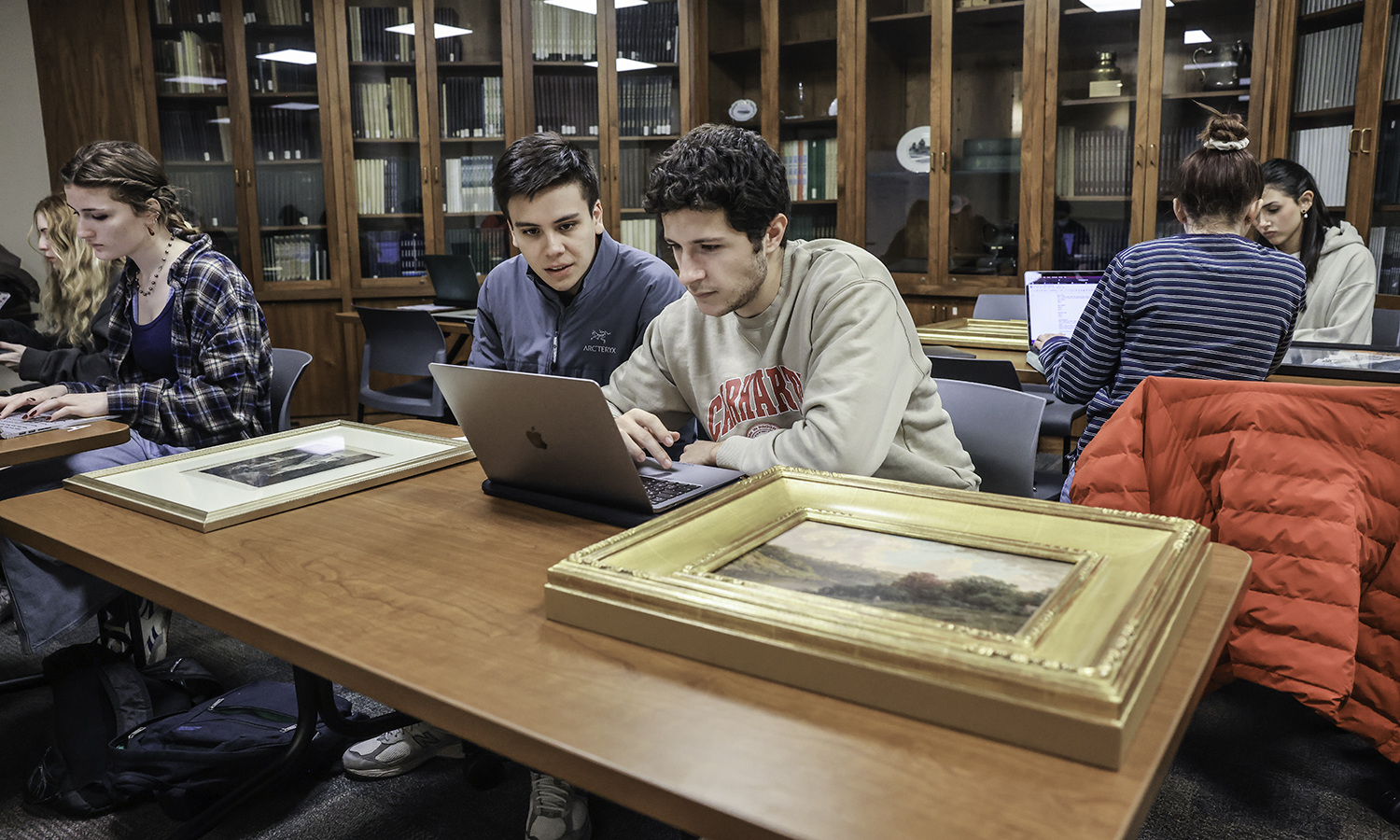 Students in “Museum Studies” with Assistant Professor of Art and Architecture Angelique Szymanek visit the HWS Archives in the Warren Hunting Smith Library.