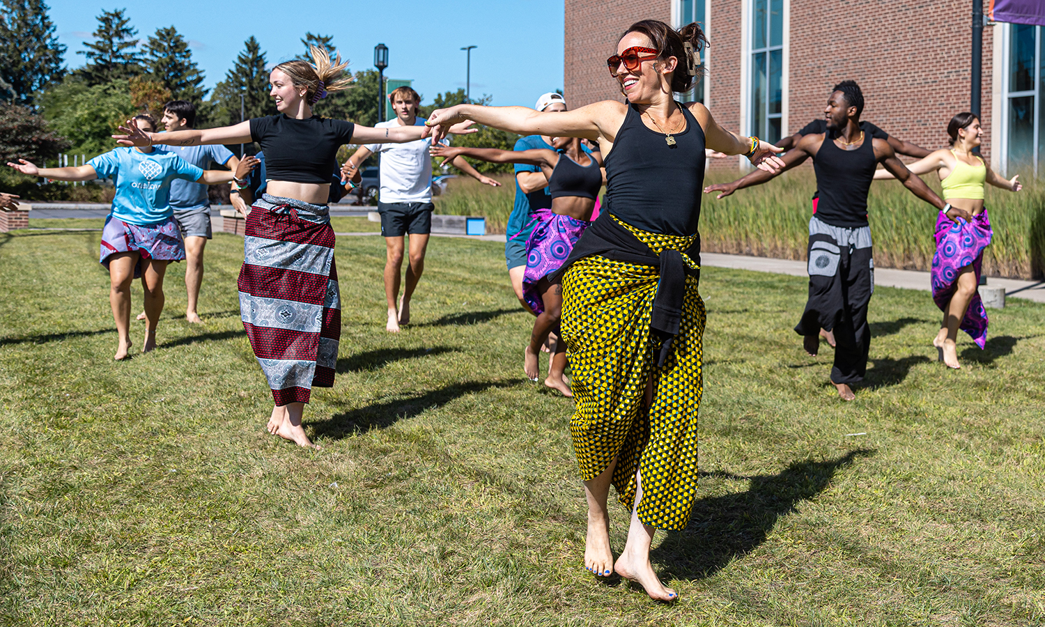 Associate Professor of Dance and Movement Studies Kelly Johnson leads students in “Intro to Jamaican Dance” outside of the Gearan Center for the Performing Arts.