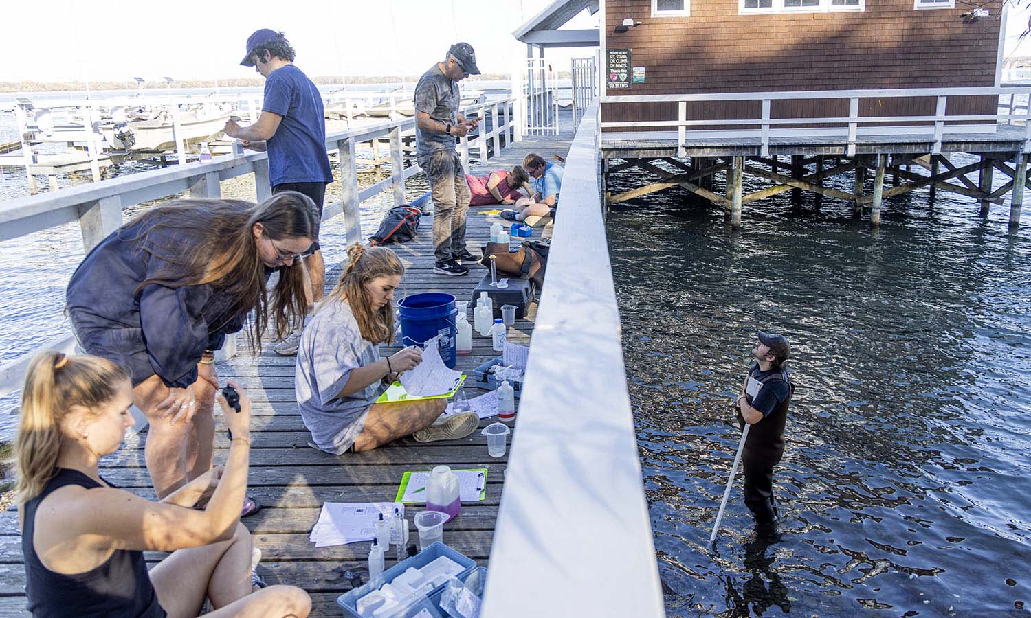 Associate Professor of Geoscience David Finkelstein leads students through a lab during “Limnology” at the Bozzuto Boathouse.