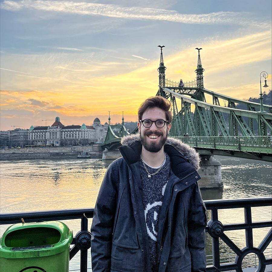 In Budapest, Hungary, Lucas Gillespie ’24 takes a photo while standing beside the Danube River.