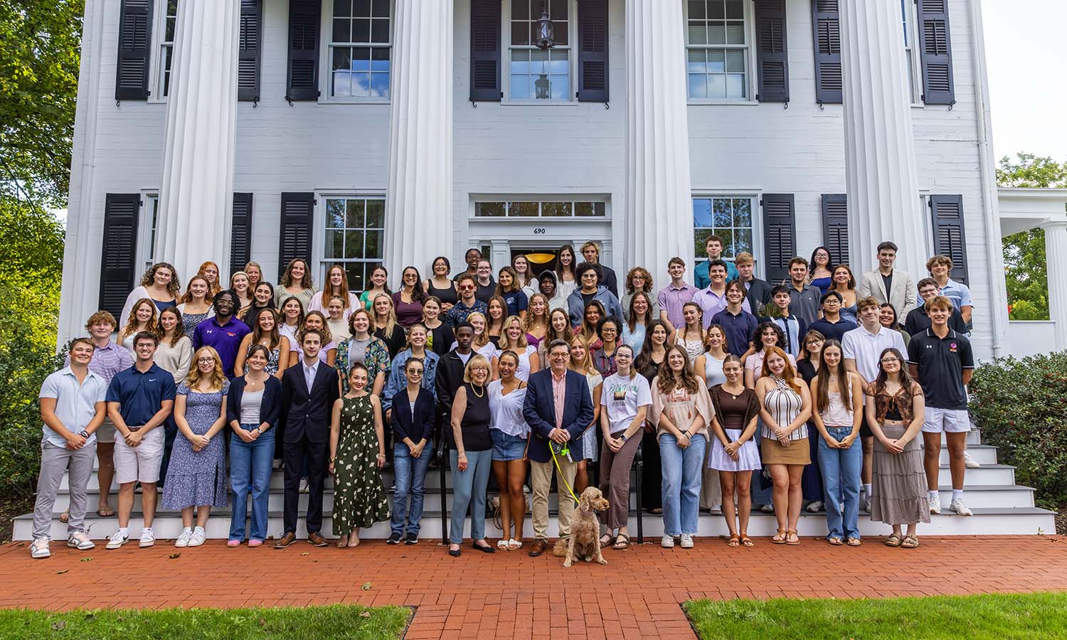 After a day of training, Orientation Mentors gather at the home of President Mark D. Gearan and Mary Herlihy Gearan. 