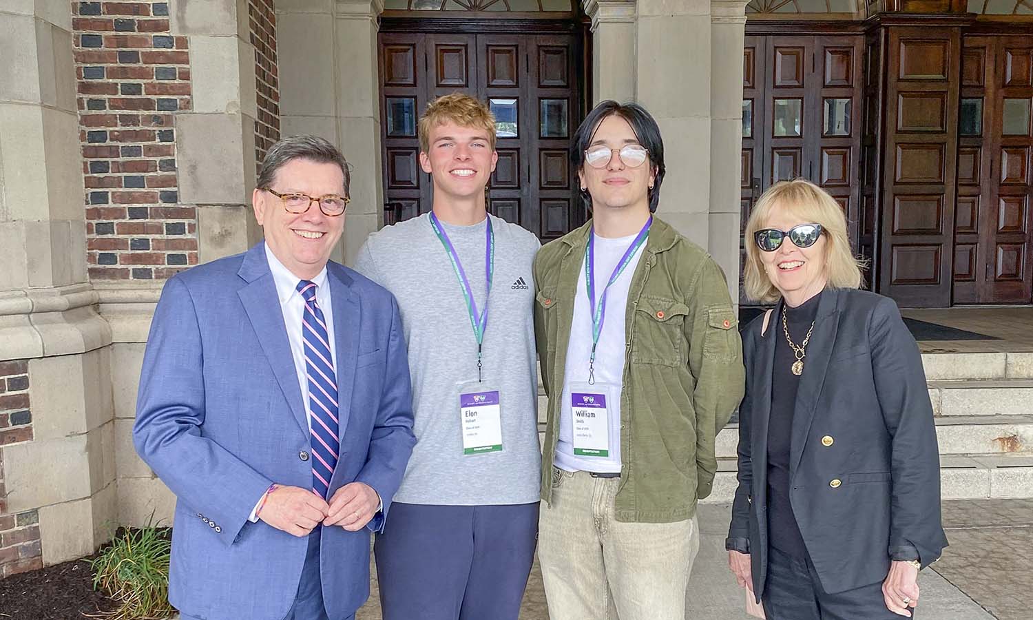 Elon Hobart ’29 and William Smith ’29 gather for a photo with President Mark D. Gearan and Mary Herlihy Gearan. Coincidentally, the first-year students share the names of HWS’ founders, John Henry Hobart and William Smith. 