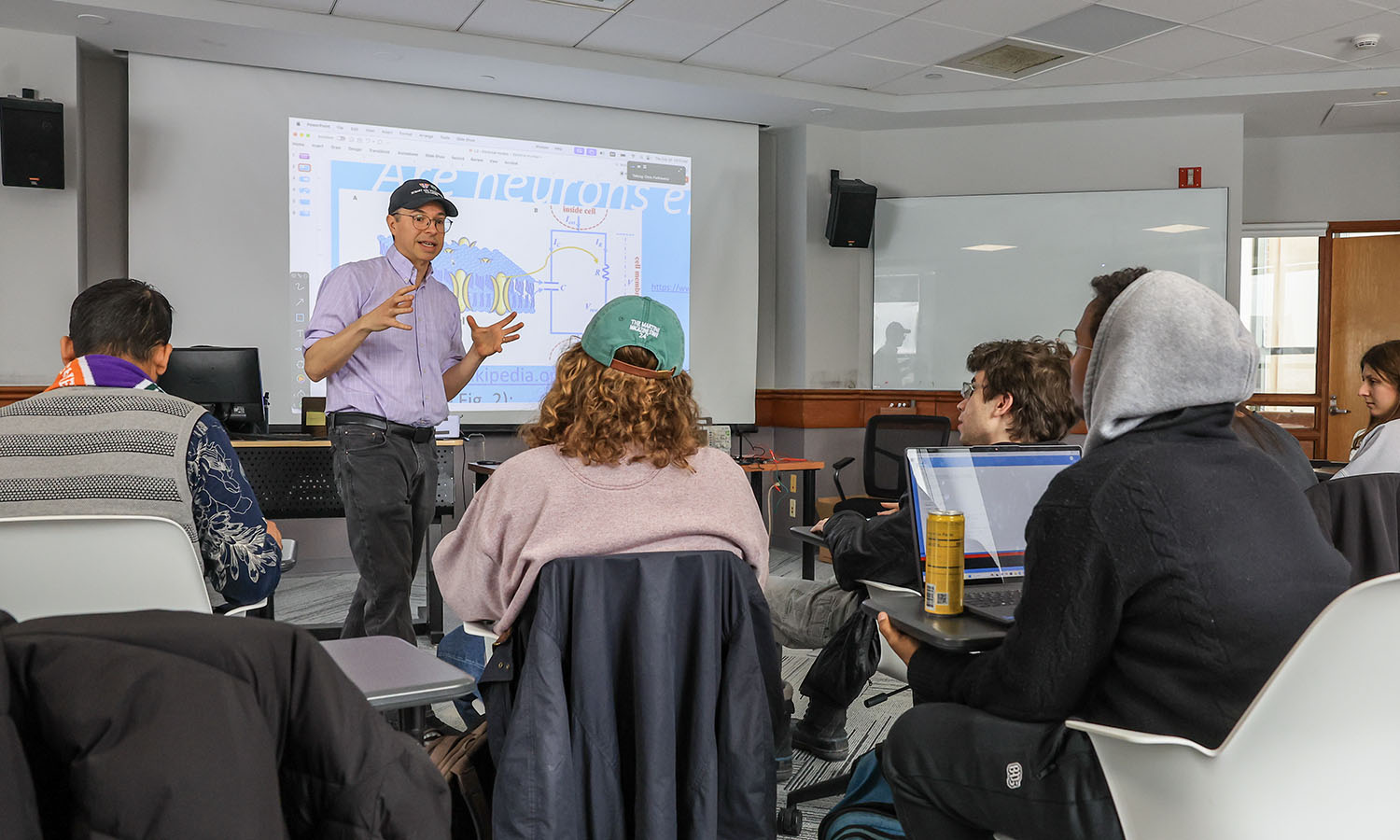 Assistant Professor of Mathematics and Computer Science Chris Fietkiewicz leads “Computational Neuroscience.” 