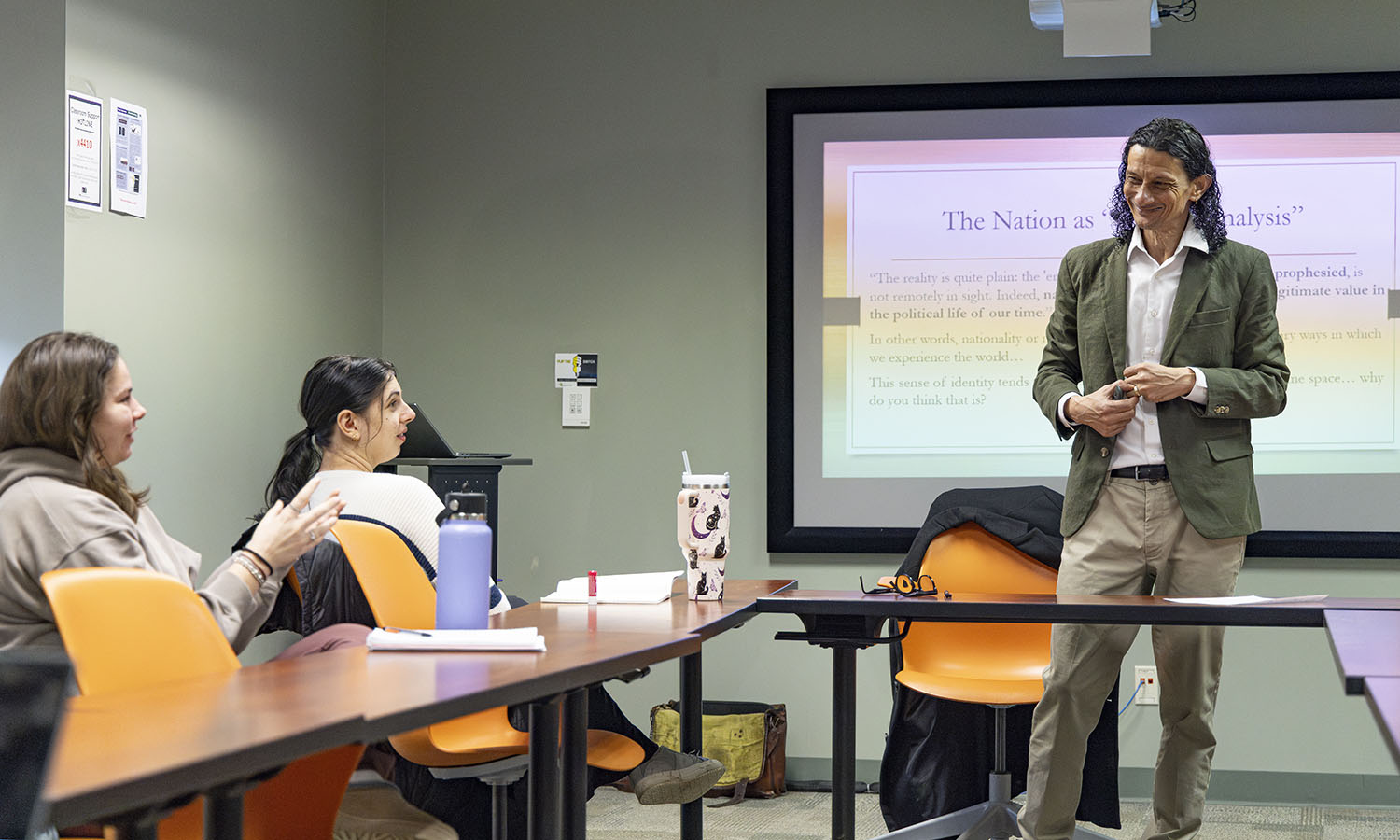 Assistant Professor of History Virgil Slade and students in "Lives of Consequence" discuss nationalism. 