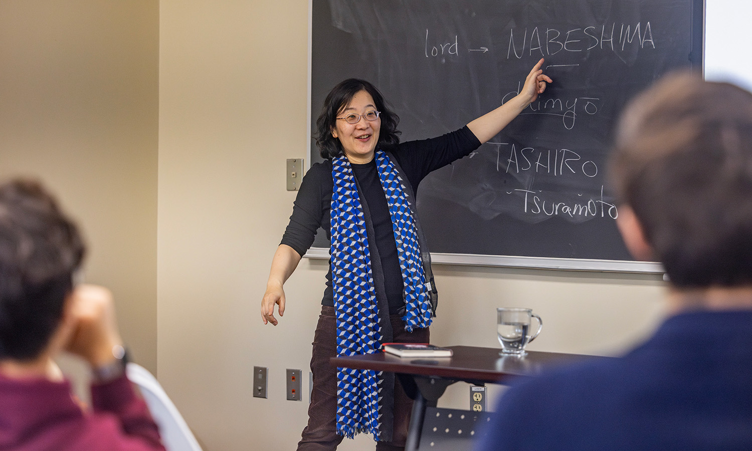 Professor of History Lisa Yoshikawa leads a lesson about the book "Hagakure" by Yamamoto Tsunetomo during “Making of the Samurai.” 