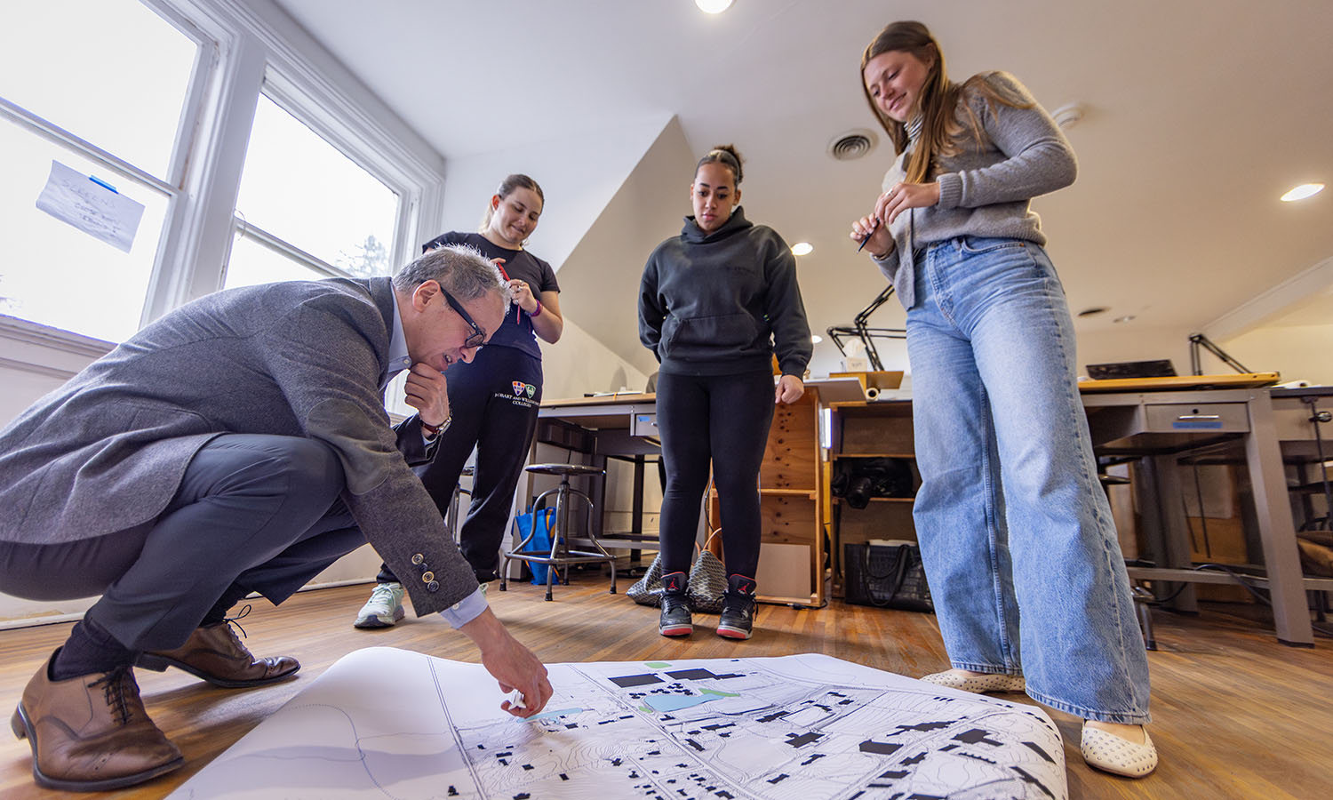 Hazel Rodriguez ’26 and Tabitha Weier ’25 work on a design project based around Odell’s Pond during “Architecture Design Studio” with Associate Professor of Art and Architecture Jeffrey Blankenship. 