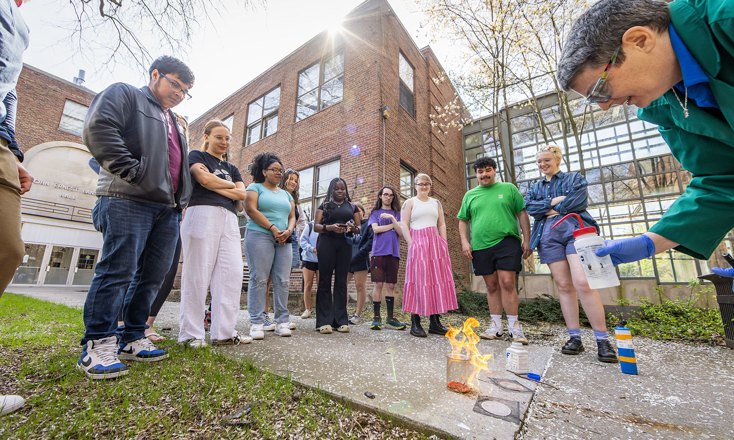 Associate Professor of Chemistry Christine de Denus displays a thermite reaction that forms molten iron when ignited for students in “Inorganic Chemistry I.” 