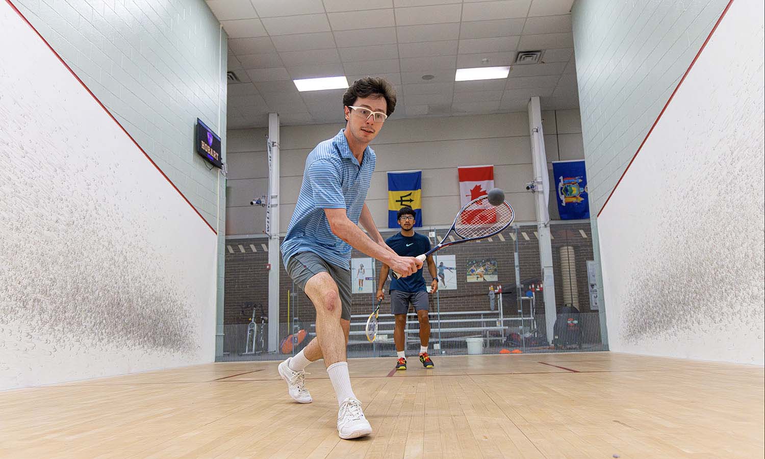 Peter Vorbach ’27 enjoys competing at the Dr. Frank P. Smith '36 Squash Center as a member of the Hobart Squash team. He says, “the courts are fantastic and we have ample space for training and spectators.” 