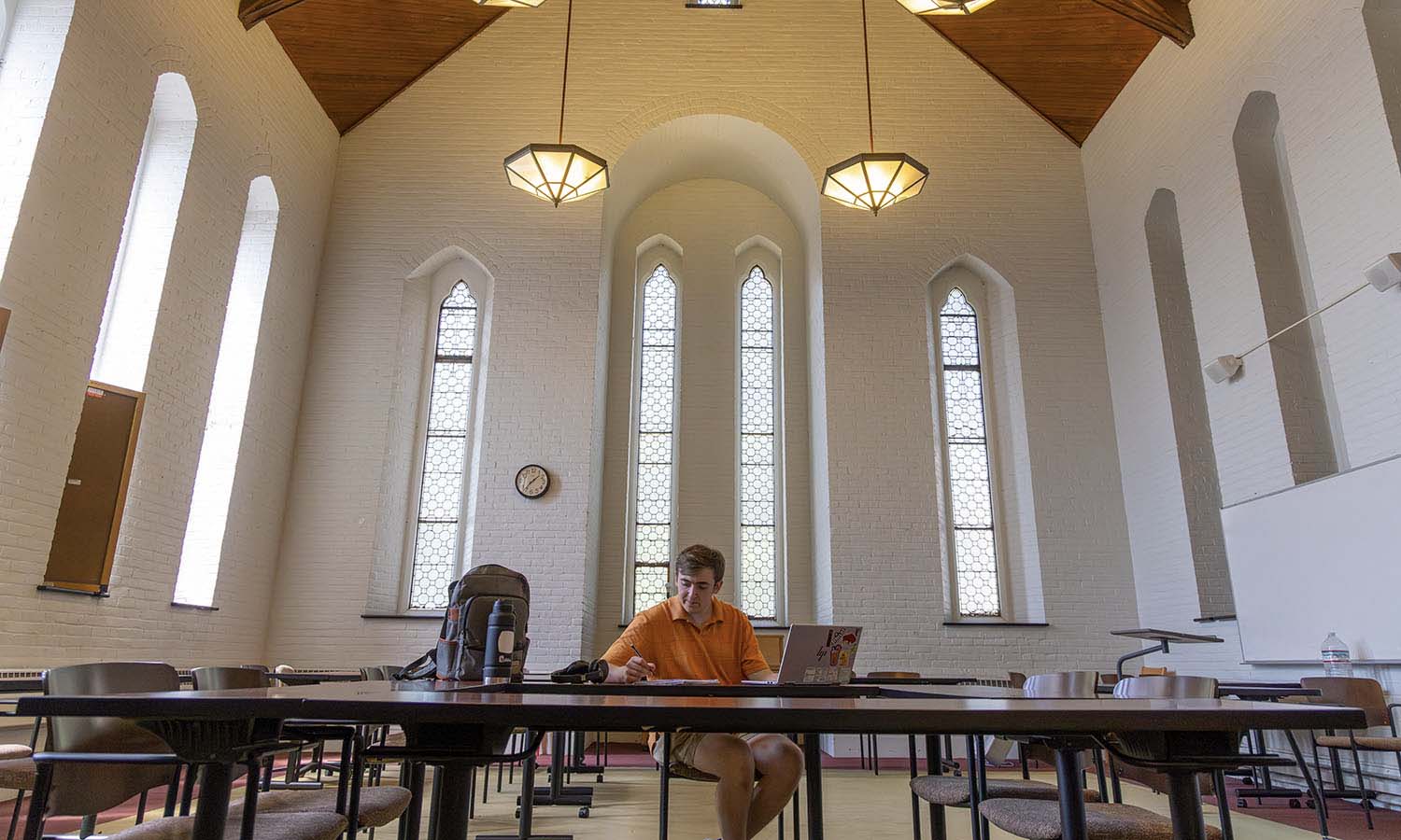Johnny Bewley ’27 loves coming to the Fisher Center in Demarest Hall to study and play some music. 