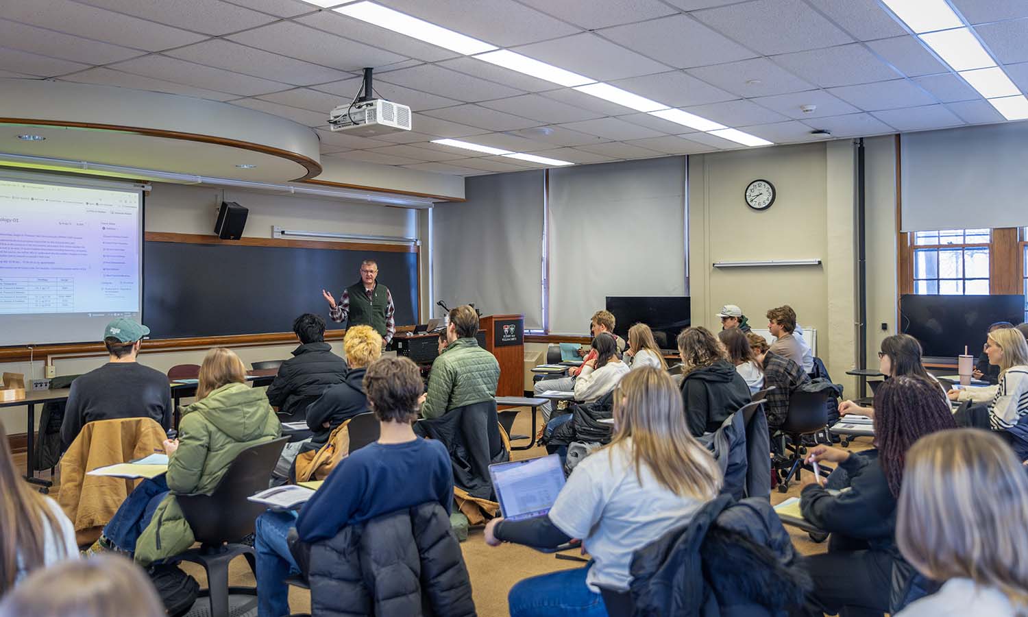 Professor of Geoscience Neil Laird reviews the syllabus at the start of class during “Introduction to Meteorology.”