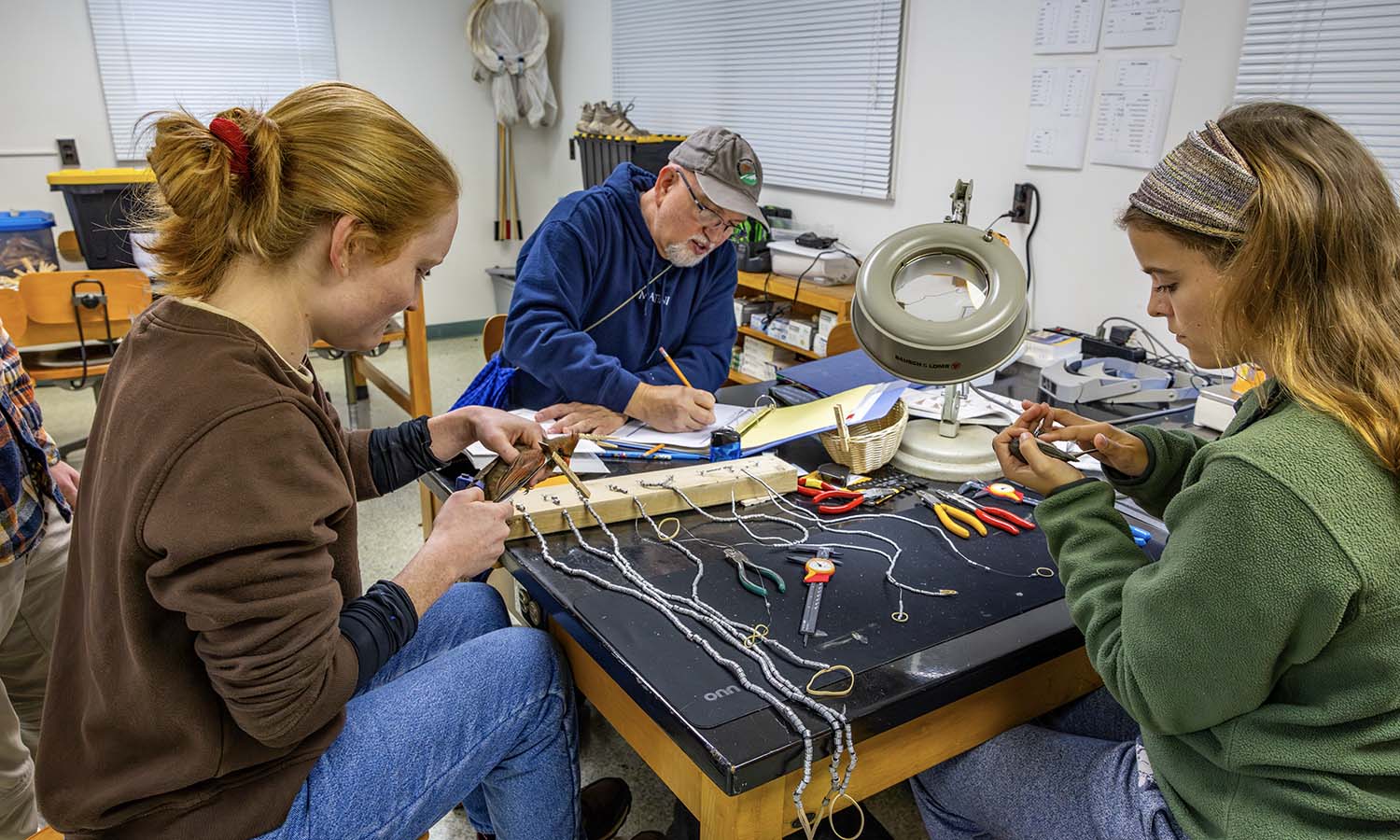 At the Henry Hanley Biological Field Preserve, Professor of Biology Mark Deutschlander works with Katie Crandall ’26 and Lily Morrell ’26 to record data, band and release birds as part of a new migration project. Permits for this work are provided by the USGS Bird Banding Laboratory and NYDEC to Professor Deutschlander, and birds are handled using ethical guidelines from the North American Banding Council.