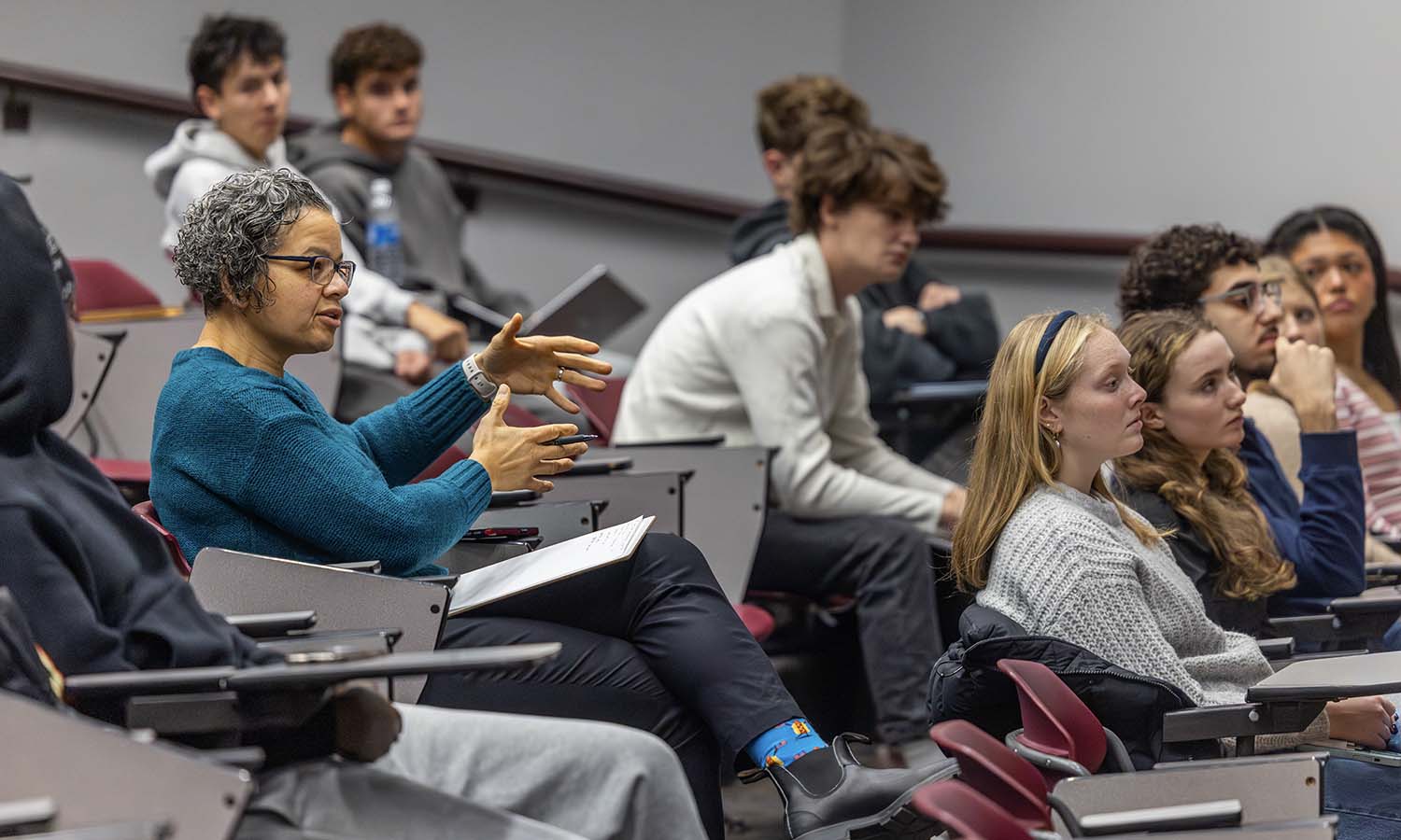 Visiting Assistant Professor of Management and Entrepreneurship Melanie Dun Moodie provides feedback to students following a presentation of their business proposal during “Entrepreneurial Leadership.” 