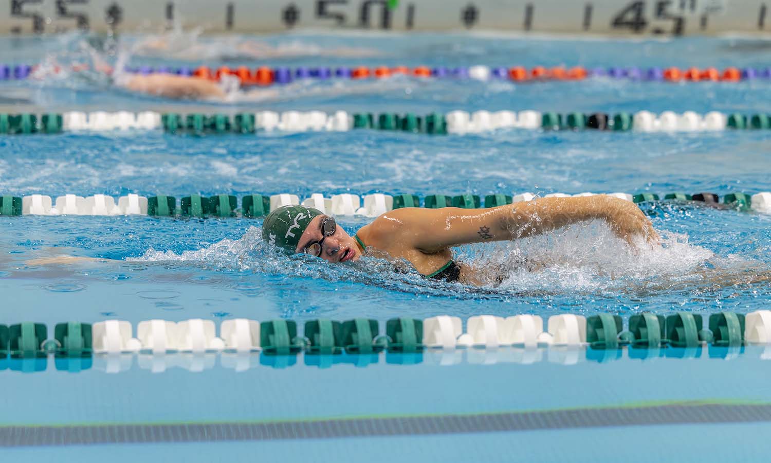 Lea Doufekias Emanuel '26 competes for the William Smith swimming and diving team as it hosts Alfred in its home opener. 