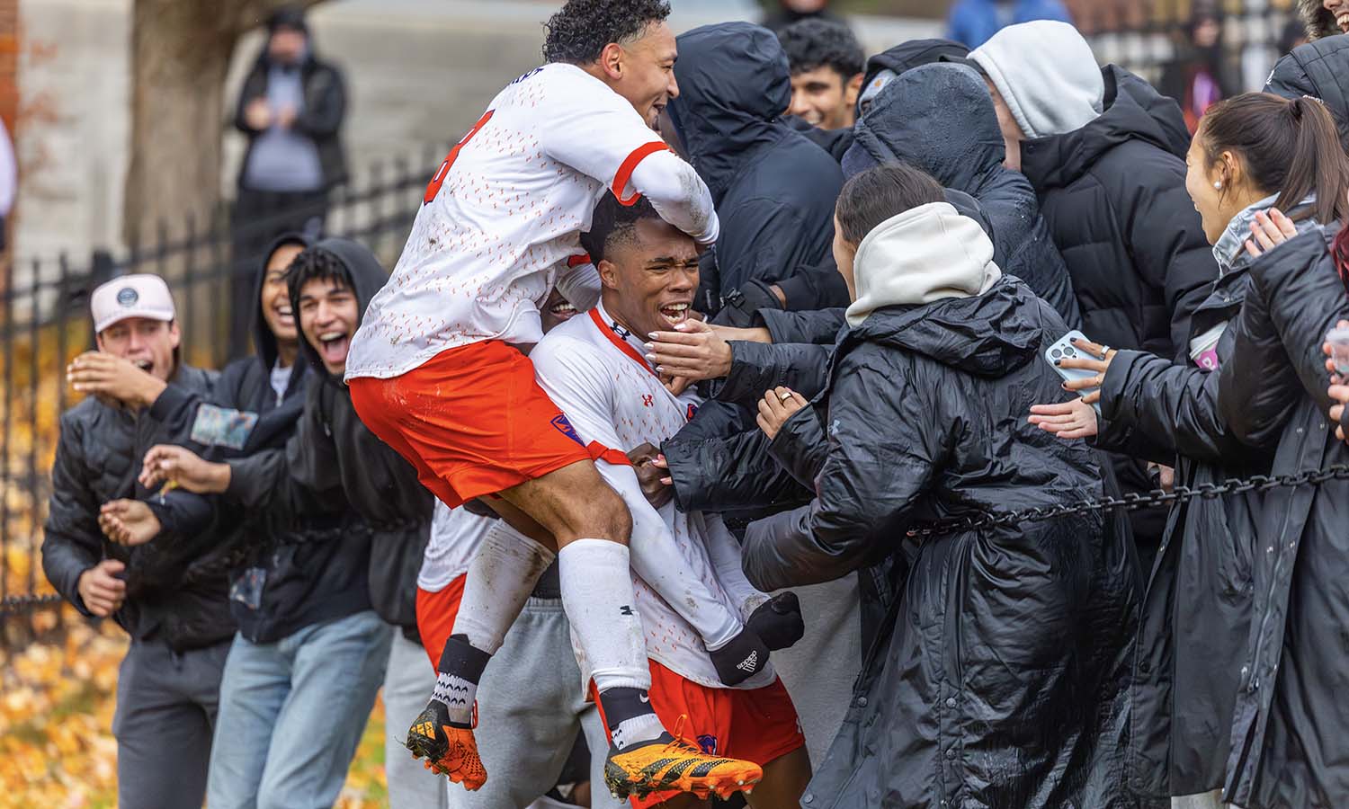 During the Liberty League Men’s Soccer Championship, Matheus Souza ’26 and La Zai Outerbridge ’27 celebrate the game-winning goal with fans 