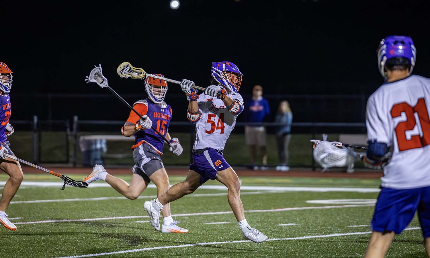 Cole Emmanuel MSM’25 fires a shot on goal during the Hobart lacrosse alumni game. 