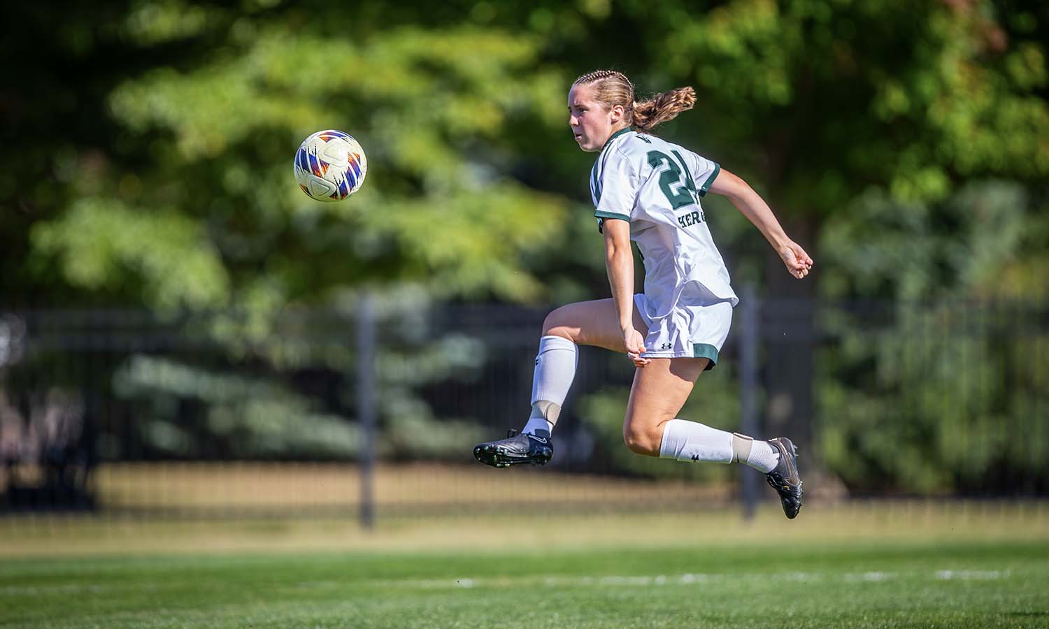 Ruth Hotaling ’26 volleys a shot towards goal during William Smith soccer’s victory over Clarkson on Cozzens Field. 