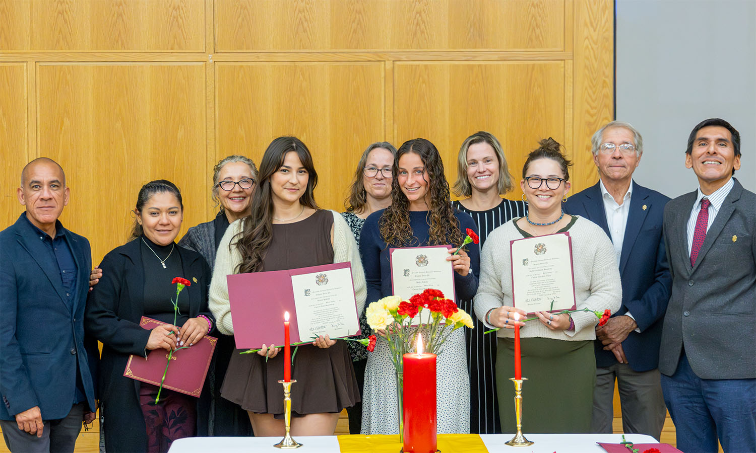 At the inaugural gathering of the HWS chapter of Sigma Delta Pi, the Spanish Honors Society, faculty pose with newly inducted honorary members and students for a photo. 