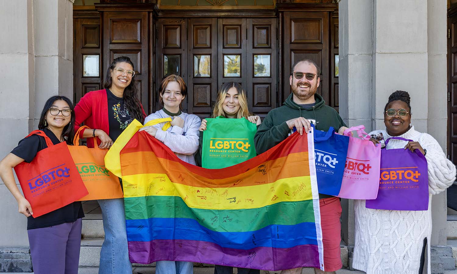 Members of the HWS community gather for a photo in recognition of National Coming Out Day. 