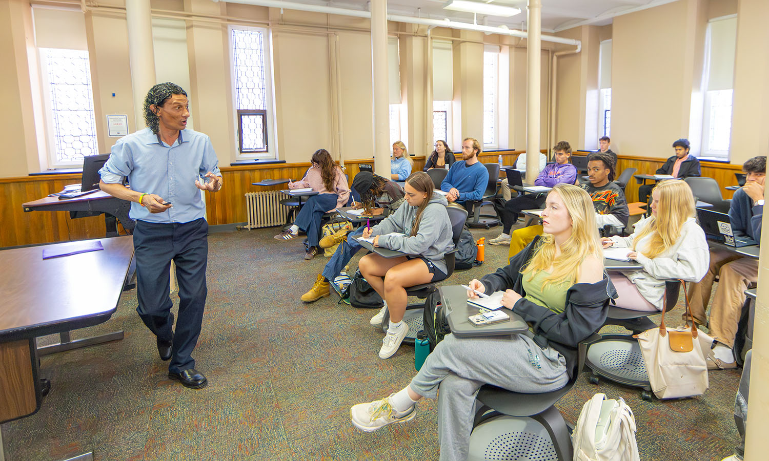 Assistant Professor of History Virgil Slade discusses Title IX with students during "Soccer: Around the World." 