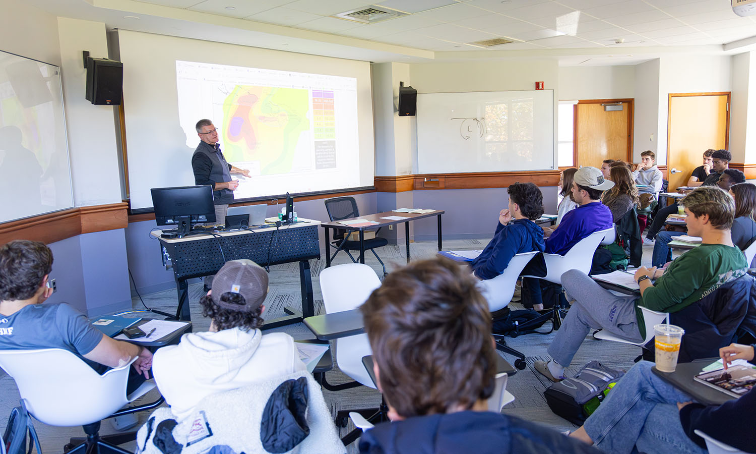 Professor of Geoscience Neil Laird and students in "Intro to Meteorology" discuss Hurricane Melissa. 