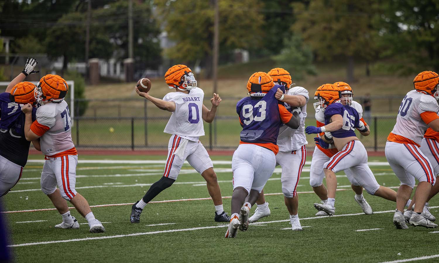 Quarterback Tru Styles ’27 fires a pass during football practice on Boswell Field. The defending Liberty League champions open their 131st season on Friday, Sept. 5 at Alfred. 