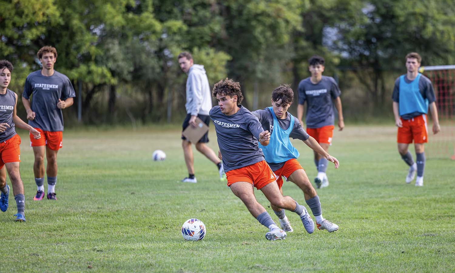 Dan Spataro ’28 dribbles past a defender during a Hobart soccer practice. 