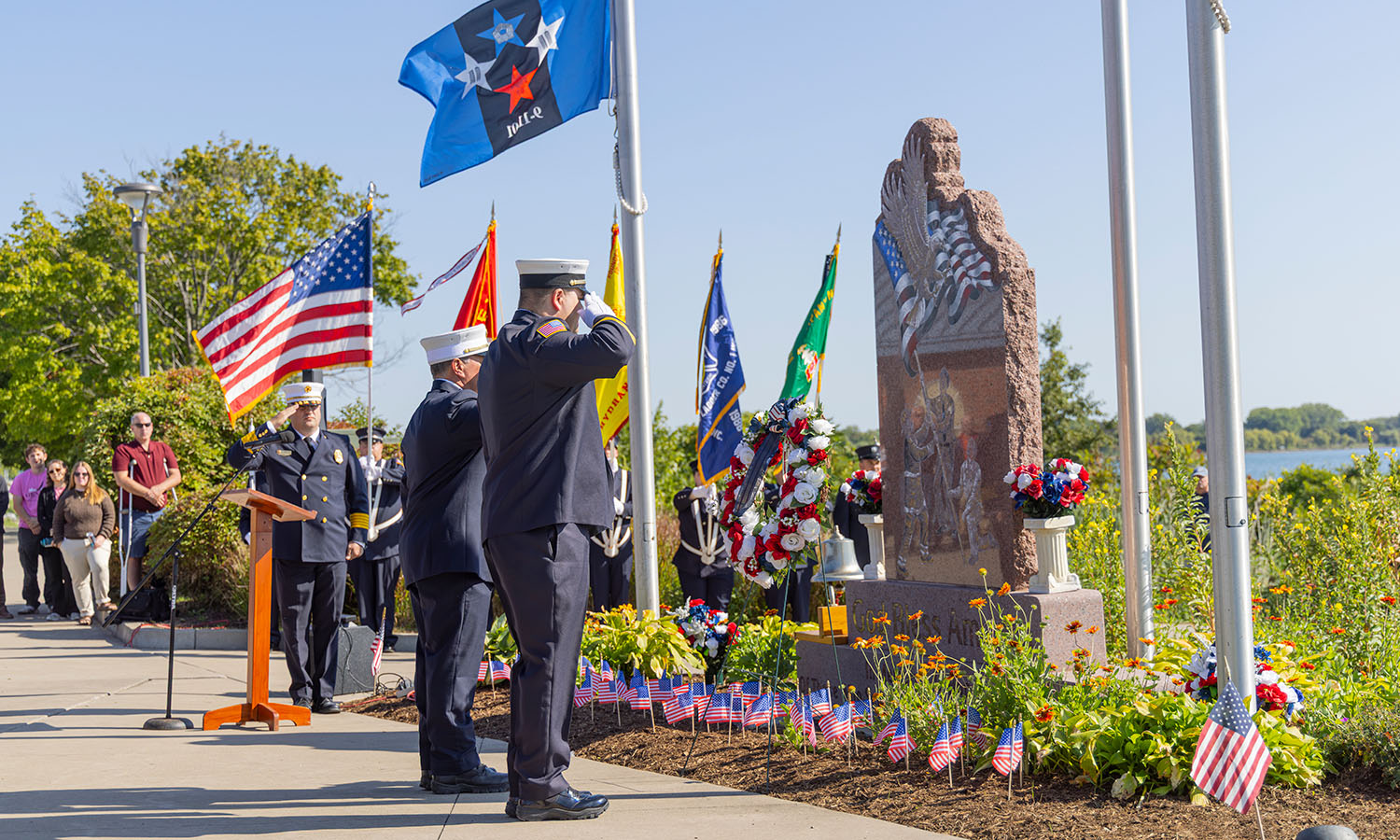 Geneva's first responders laid a wreath at the foot of the September 11 Memorial at Long Pier during the city's Remembrance Ceremony. 
