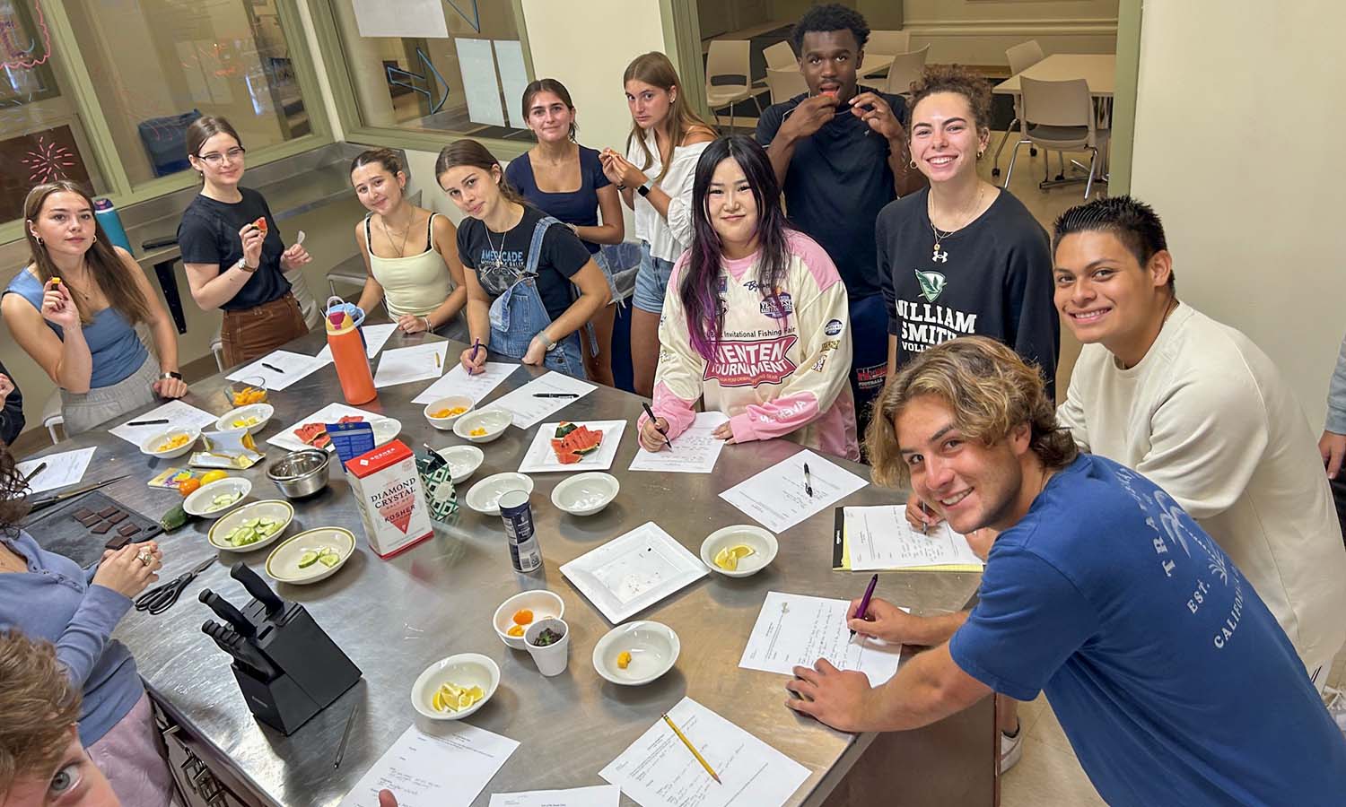 Students in Associate Professor of Anthropology Chris Annear’s First-Year Seminar “What’s Eating You?” pose for a photo while doing a salt tasting on a variety of food ingredients to determine how the items are transformed in taste, texture and aroma. 