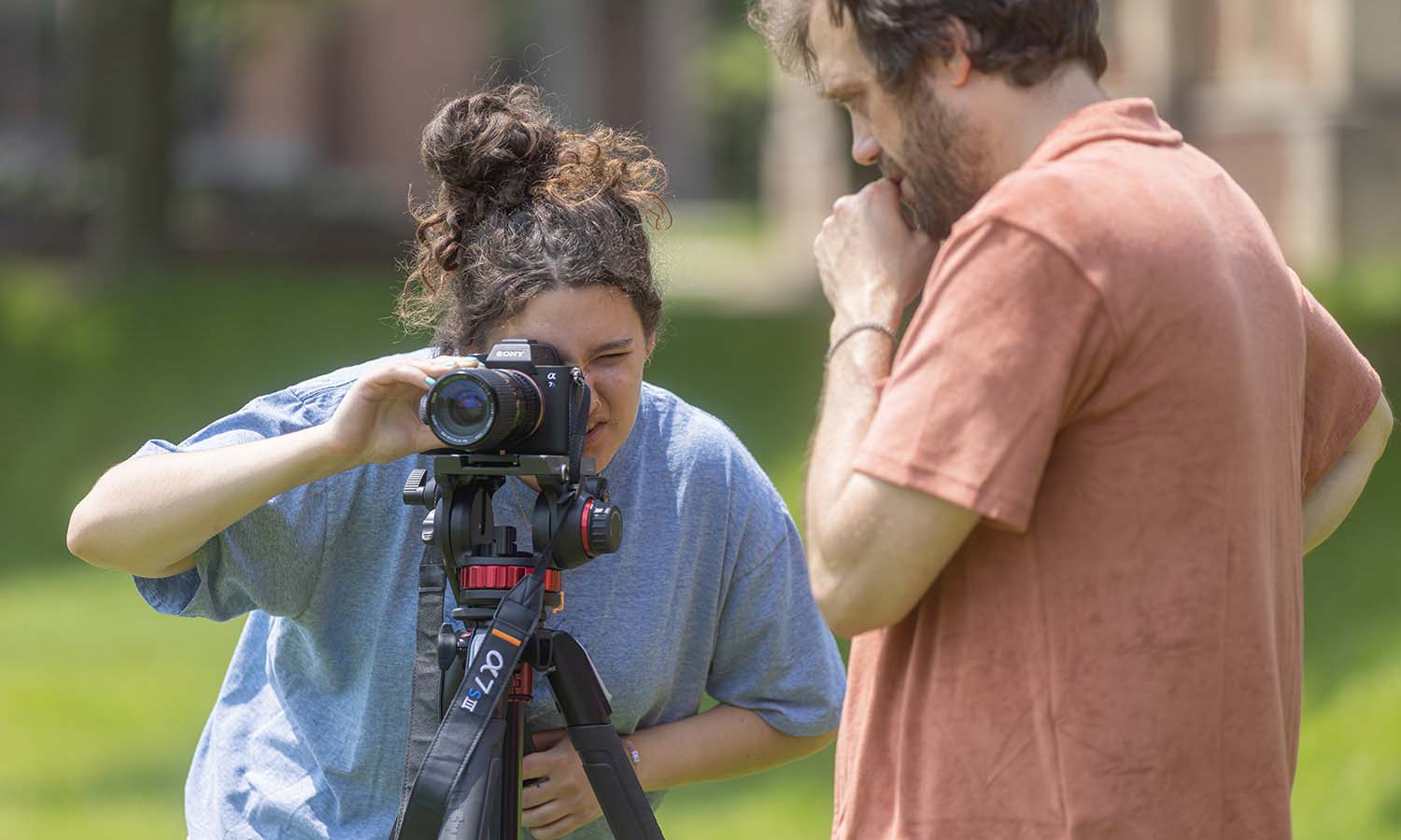 Ryan Brady ’26 tests vintage lenses with Instructor of Practice for Media and Society Casey Puccini while working to produce a feature length film. 