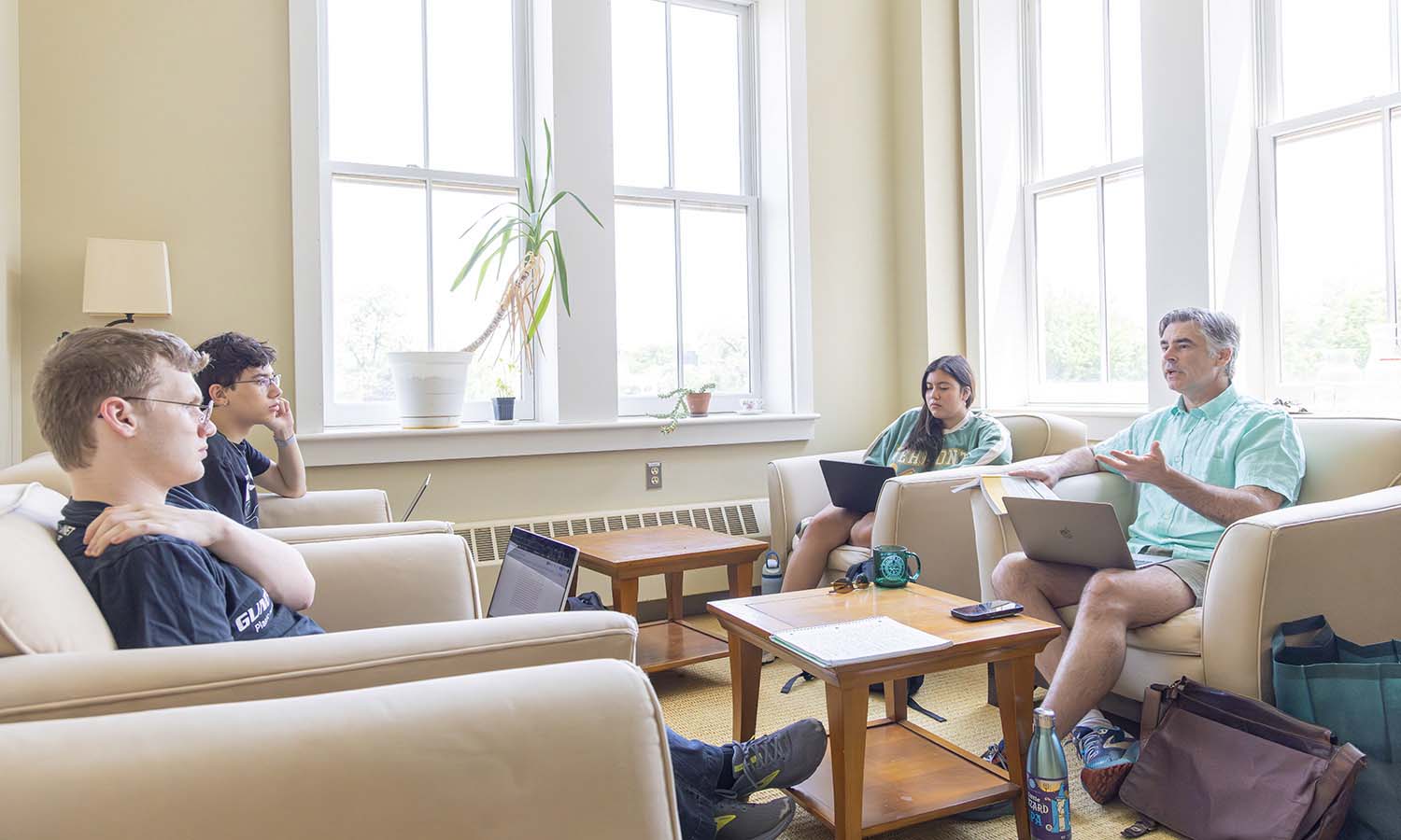 As part of their mentored research project titled “China in Africa,” Hillel Wasserman ’28, Hudson Chou ’27 and Krissia Hercules ’27 discuss cross-cultural engagement with Associate Professor of Anthropology Chris Annear. 