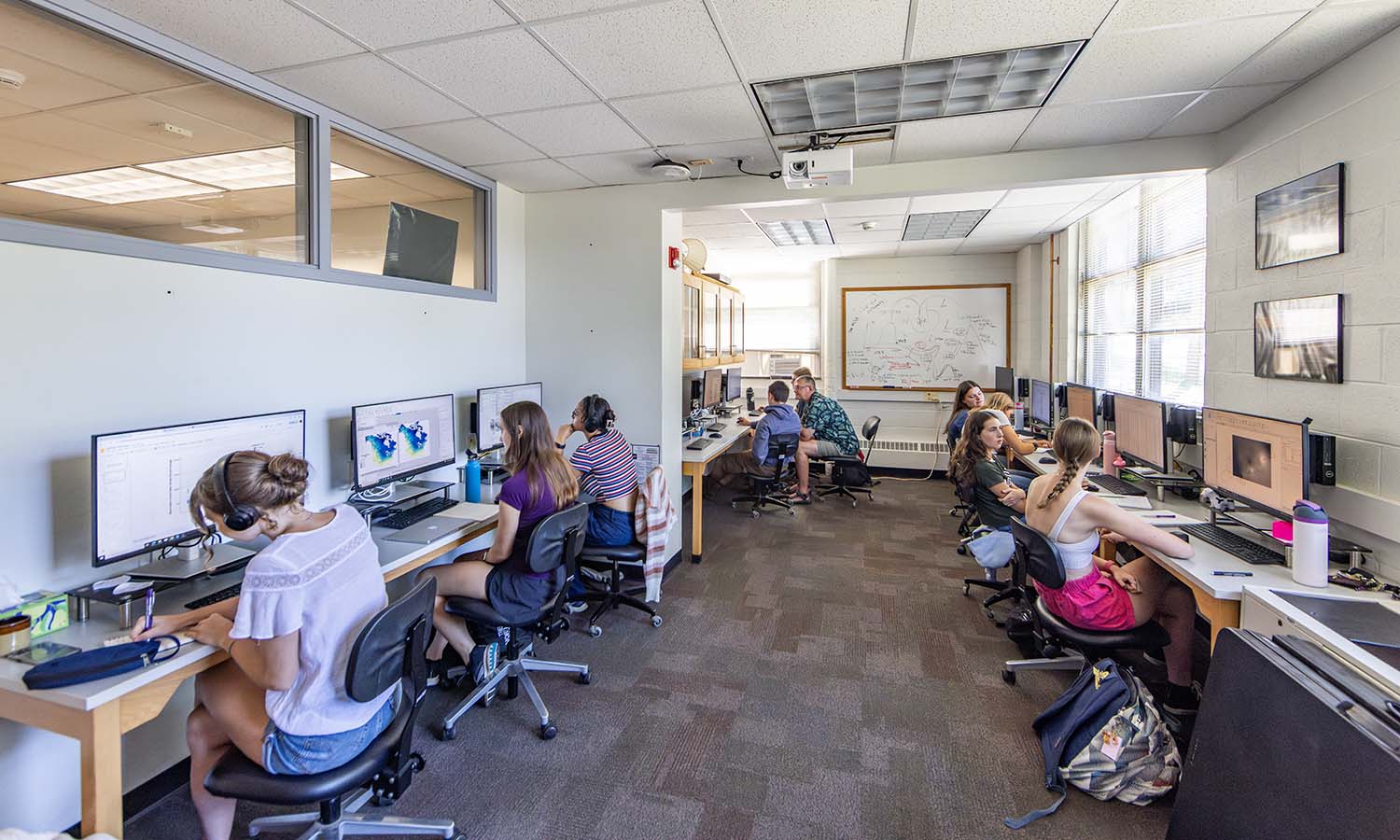 Summer research students work in the HWS Geoscience Weather and Climate computer lab during the 2025 HWS Summer Research and NEPARS Research Experiences for Undergraduates programs. 