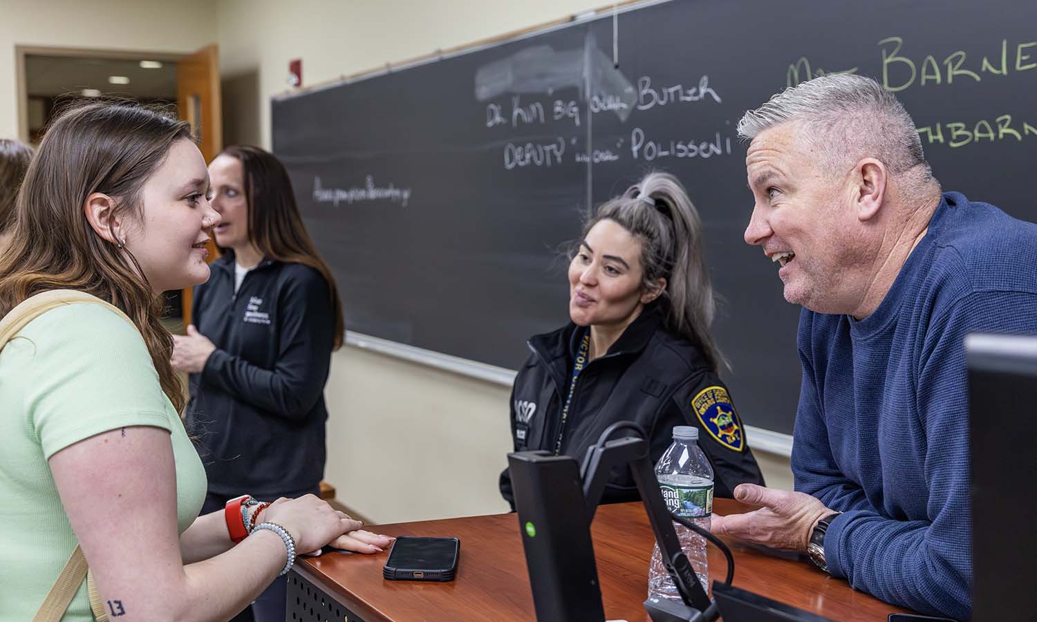 Following the conclusion of “Sociology of Police and Policing” with Professor of Sociology Jim Sutton, students speak to Mental Health Professional at Blueline Wellness Dr. Kim Butler, Deputy from the Ontario County Sheriff’s Office Alanna Perna-Polisseni and retired Chief of the Fairport Police Department Matt Barnes about mental health and law enforcement careers. 
