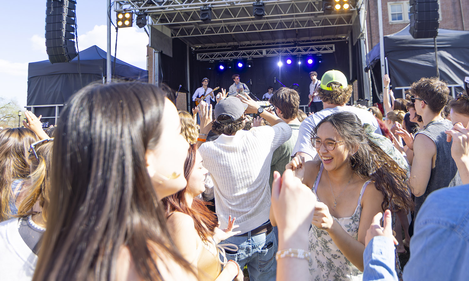 Students dance on Bristol Lawn while enjoying Folk Fest.   