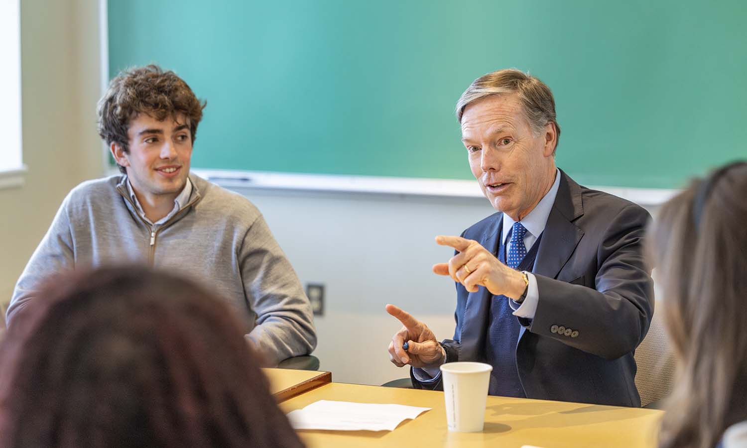 U.S. Ambassador R. Nicholas Burns visits with students in Trinity Hall. 