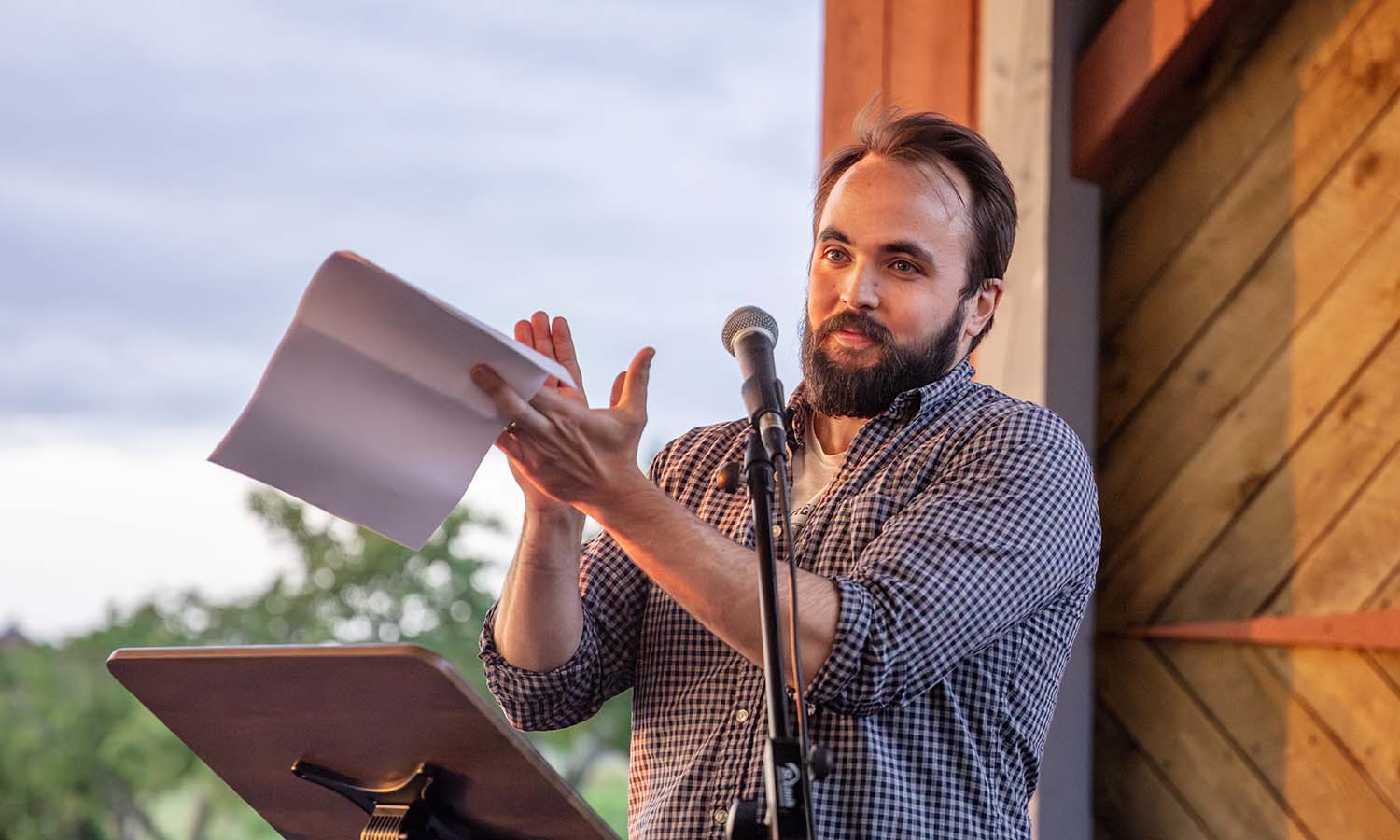 Professor of Practice and Director of HWS Debate Daniel Schonning ’16 reads from his award-winning poetry collection “As When Waking” during a Seneca Review poetry reading at Two Goats Brewing. The book recently received the Poetry Society of America's Four Quartets Prize. 