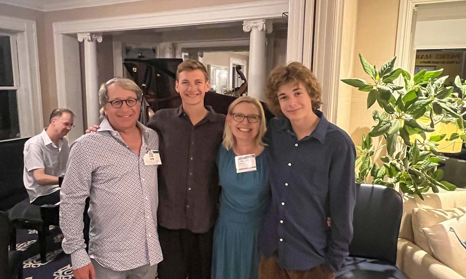 Mike Gantcher ’92, P’27, P’30, Billy Gantcher ’27, Christina Gantcher P’27, P‘30 and Ben Gantcher ‘30 pose for a photo at the NYC Young Alum gathering that was held at the Gantcher home in Brooklyn. 