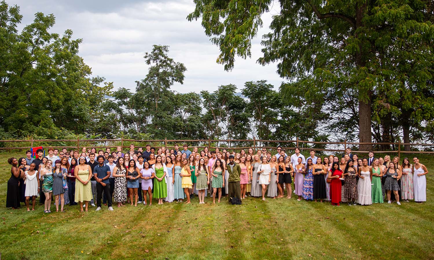 Members of the Class of 2027 gather behind the Carr McGuire House for the Senior Toast, hosted by HWS Forever.  