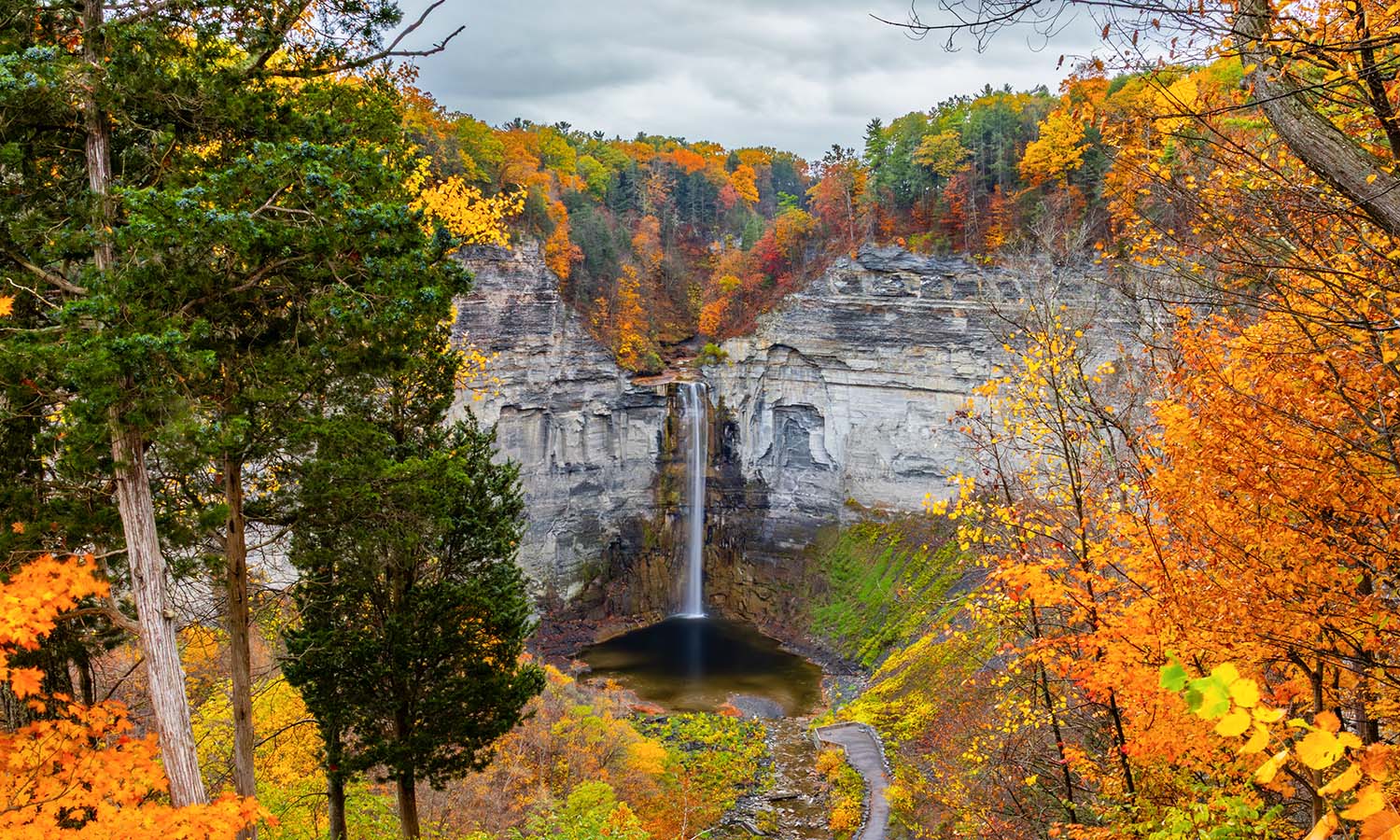 At 215 feet, Taughannock Falls is the tallest waterfall in New York State. Here, it is surrounded by changing leaves. 