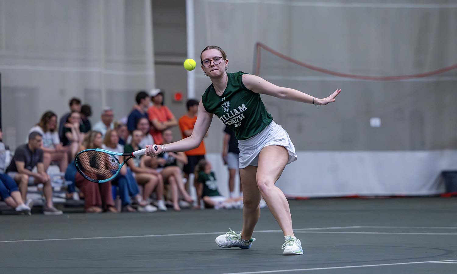 Elizabeth Legg ’26 returns a shot during William Smith tennis’ victory over Nazareth. 