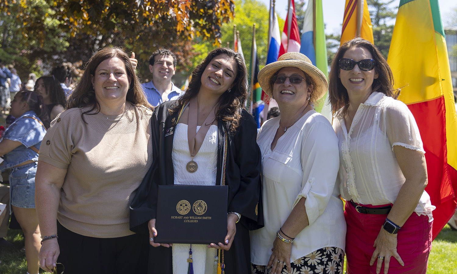 Lea Doufekias Emanuel '26 poses with family after commencement.  