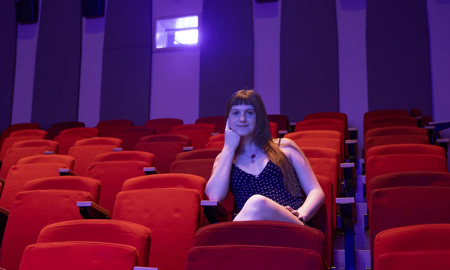 A favorite spot for Media and Society major Michaela Riley '27 is the Fish Screening Room, where she watches films as part of the HWS Film Club. 