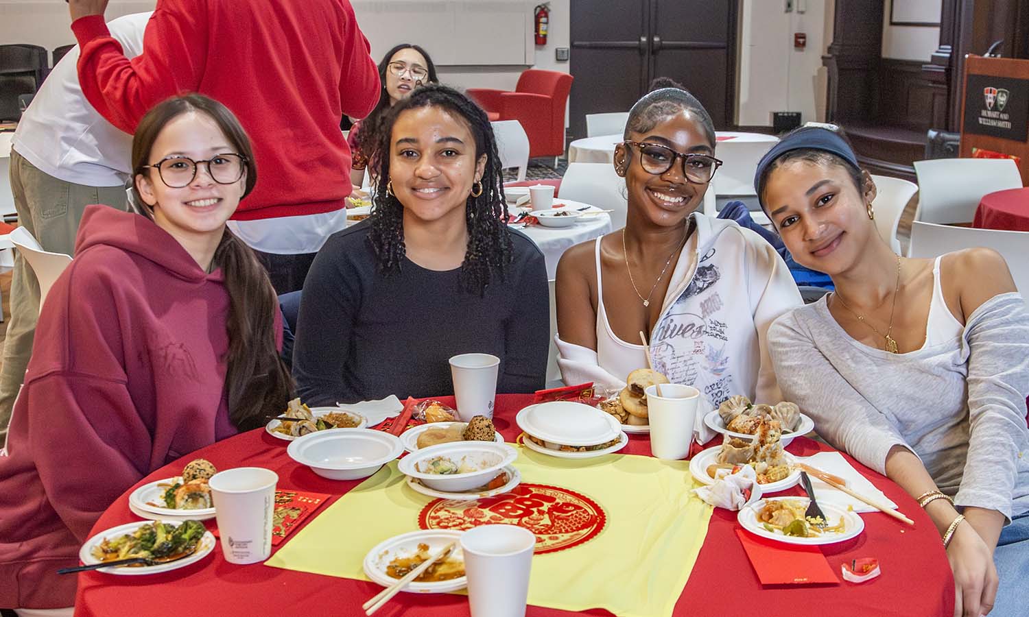 Students pose for a photo while attending the Lunar New Year Celebration, hosted by the Asian Student Union in Bartlett Theatre. 