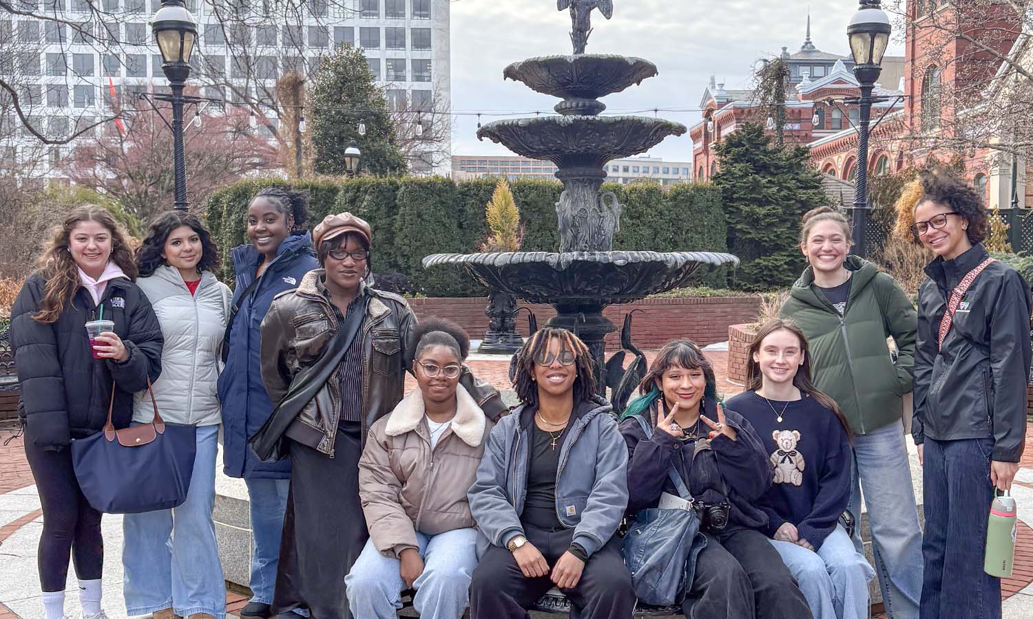 Students stop for a picture while visiting Washington, D.C. with the Abbe Center for Jewish Life. Their trip included a Friday night Shabbat Dinner, a student-run tour of the monuments around the National Mall, and visits to the National Museum of African American History and the United States Holocaust Memorial Museum.  