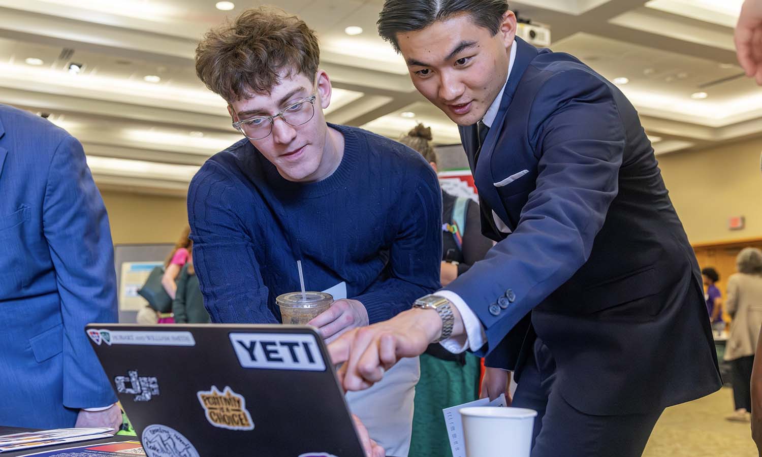Andy Dinh ’27 presents on his work at the 18th Annual Community Engaged Scholarship Forum in the Vandervort Room. 